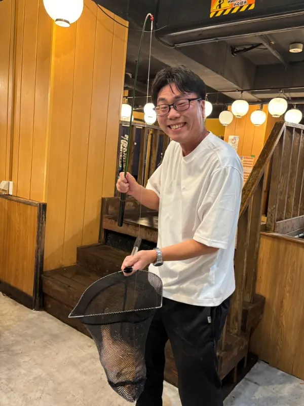 鯛を釣り上げた木内さん